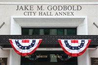 New building with banners.