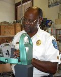 Worker fixing a parking meter.