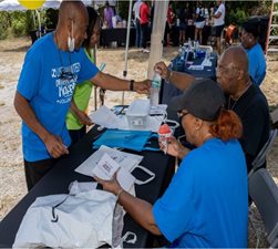 information tent with people