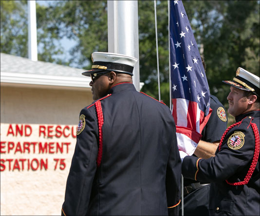 JFRD members raising the U.S. flag