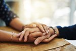 holding hands confronting each other due to mourning