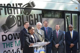 Photo of Council Member E. Denise Lee addressing the audience.