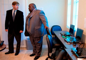 Mayor Peyton and Pastor John Guns discuss a new alternative to suspension center.