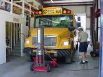 School bus in a garage.