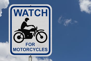 watch for motorcycles sign